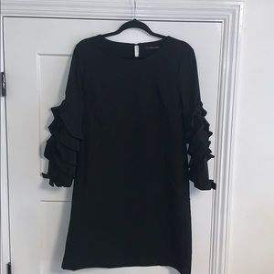 BLACK RUFFLE SLEEVE DRESS SIZE SMALL. NEW!